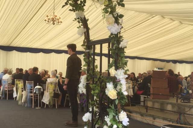 Dignitaries have lunch in the Dock End marquee.