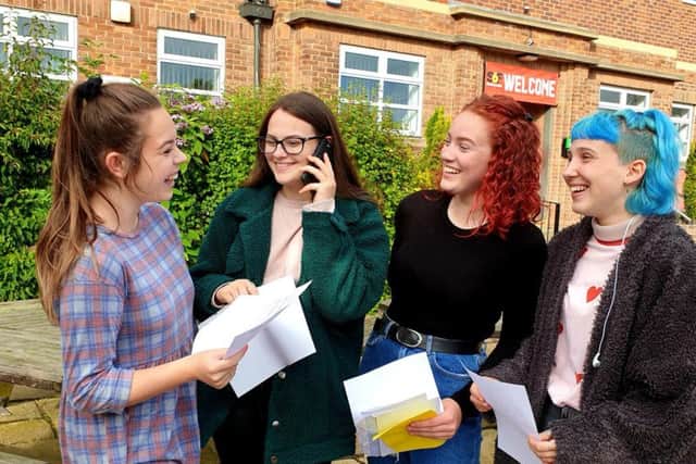 Megan Trenham, Emma Phipps, Megan Ward and Lucy Curtis discuss their results at Scarborough Sixth form College this morning