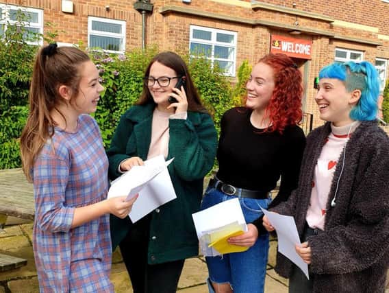 Megan Trenham, Emma Phipps, Megan Ward and Lucy Curtis discuss their results at Scarborough Sixth form College this morning