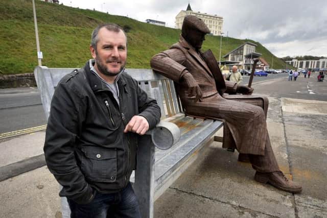 Ray Lonsdale with the Freddie Gilroy sculpture on North Bay.