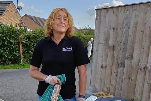 Lisa O'Boyle collecting litter. PIC: Wendy Knipe