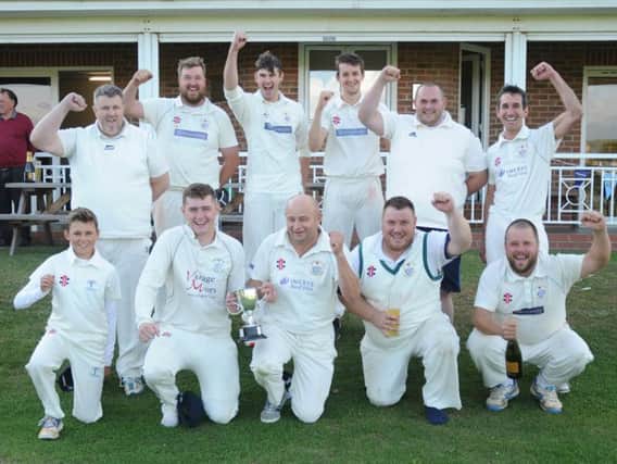 Bridlington 2nds celebrate winning the Division One title thanks to a victory against Folkton & Flixton 2nds in their final game of the season. Picture by Dom Taylor.