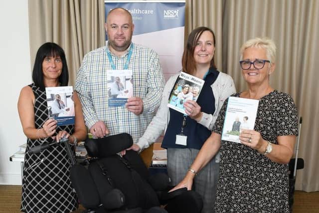 NRS Health Care - Lisa Walker, Neil Hopper,Amanda Rea and Sharon Martin pictured with one of latest chairs on the market