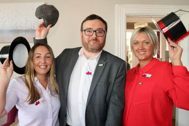Saint Cecilias three managers Tanya Thomas, Dale Bowman and Donna Henderson celebrate the ratings success.