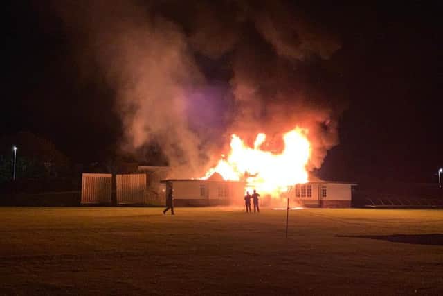 The flames ripping through the building.