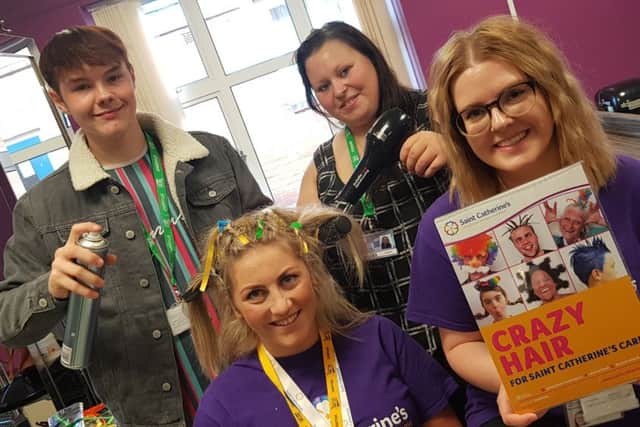 Participants are encouraged to create crazy hairstyles as a way of raising funds to support patient care.