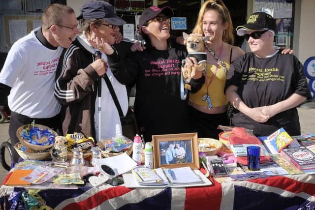 Sandra Wilson, centre, with volunteers at her mental health stall in Scarborough. PIC: Richard Ponter