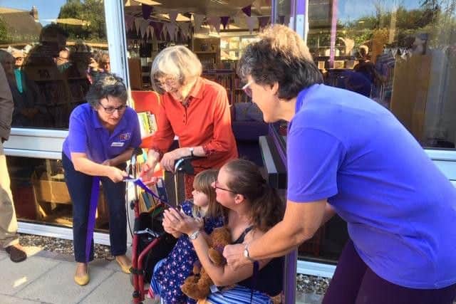 Barbara Gardiner cutting the ribbon