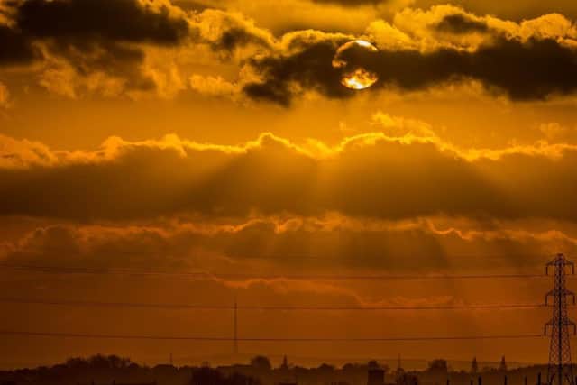 A magnificent sunset over Castleford, looking towards Emley Moor transmitting station, near Huddersfield. Picture: James Hardisty.
