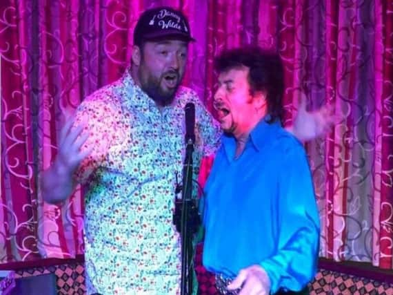 Jason Manford sings a duet with musician Danny Wilde earlier this year
