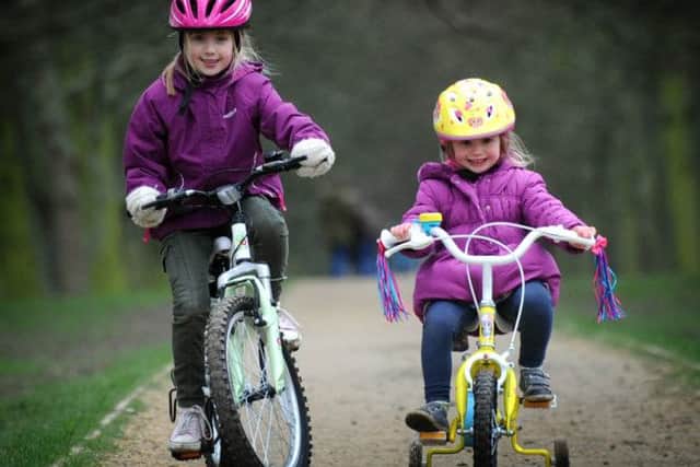 Isabelle Miller with her sister Imogen at Temple Newsam in Leeds. Picture: Simon Hulme