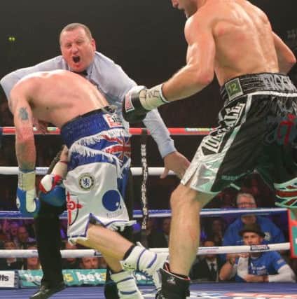 Referee Howard Foster stops Carl Froch (right) and George Groves during the WBA and IBF Super Middleweight Title fight at the Phones 4u Arena, Manchester. PRESS ASSOCIATION Photo. Picture date: Saturday November 23, 2013. See PA Story BOXING Manchester. Photo credit should read: Dave Thompson/PA Wire.