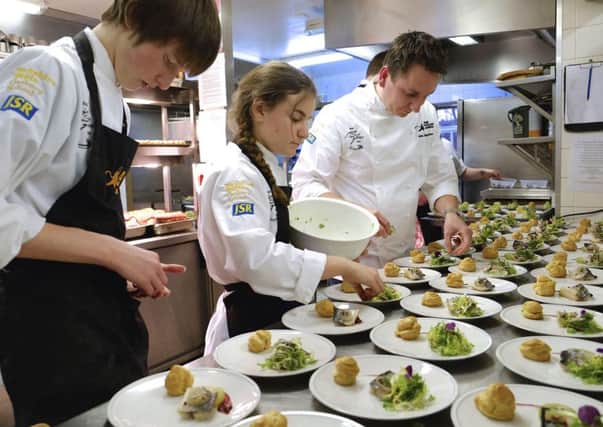 from left: finalist Oliver Robinson, winner Georgie Smithson-Brown and chef James Mackenzie © pic by Tony Bartholomew