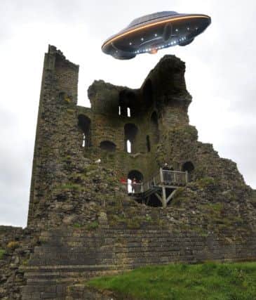 Composite PicA UFO over Scarborough CastlePicture by Neil Silk25/05/14
