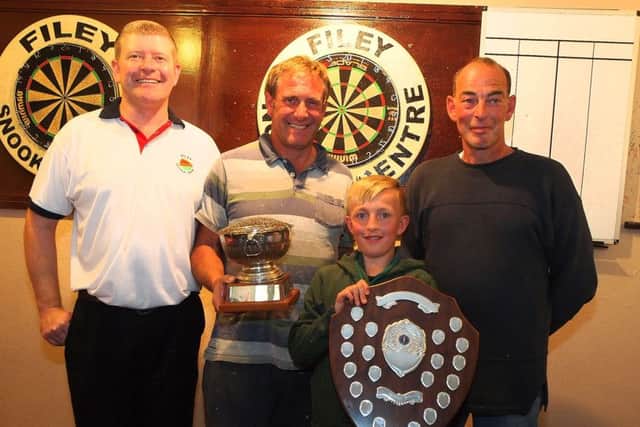 Landlord of Filey Snooker Centre Richard Casling, Filey Open Codling Championship winner with the W.Witty Challenge Bowl Andy Crowe (Scarborough with a catch of cod 29-0-0) Adam Hutchinson with the Ernest Blowman memorial shield after landing a winning catch of 3-4-7 . Match Sponsor Jamie Richardson