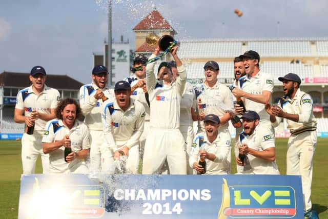 Yorkshire celebrate winning the Division One County Championship during day four of the LV= County Championship Division One match at Trent Bridge, Nottingham. SSOCIATION Photo. Picture date: Friday September 12, 2014. See PA story CRICKET Nottinghamshire. Photo credit should read: Mike Egerton/PA Wire