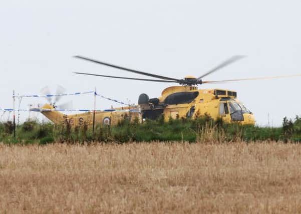 A Private Helecopter has crashed down the cliffs at Flamborough Head East Yorkshire. --
NBFP PA1438-8h --
Pictures taken from the Flamborough Golf course