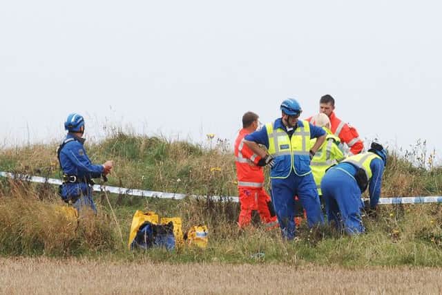 A Private Helecopter has crashed down the cliffs at Flamborough Head East Yorkshire. --
NBFP PA1438-8l --
Pictures taken from the Flamborough Golf course