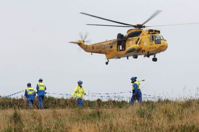 A Private Helecopter has crashed down the cliffs at Flamborough Head East Yorkshire. --
NBFP PA1438-8m --
Pictures taken from the Flamborough Golf course