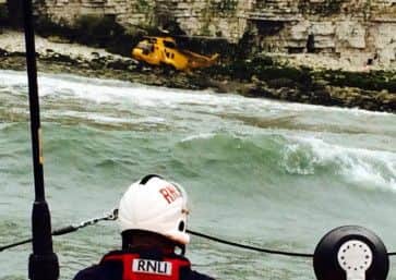 A Bridlington RNLI crew member at the scene of the crash