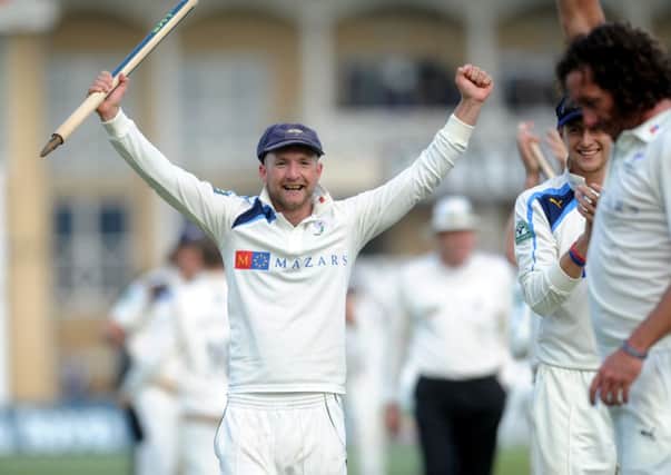 LV = County Championship Division One.
Nottinghamshire v Yorkshire.
Yorkshire's Adam Lyth celebrates after winning the championship. 
12th September 2014. Picture Jonathan Gawthorpe.