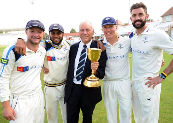 LV = County Championship Division One.
Nottinghamshire v Yorkshire.
Yorkshire's players celebrate after winning the championship. From left, Adam Lyth, Adil Rashid, Executive Chairman Colin Graves, Gary Ballance and Liam Plunkett.
12th September 2014. Picture Jonathan Gawthorpe.