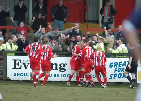 Boro players and fans celebrate Michael Coulson's goal for Scarborough Fc v Woking in the Conference on February 18 2006