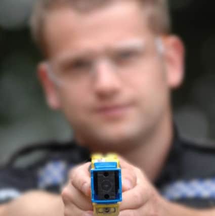 Humberside Police Officers spend the day training to use a Taser Gun-
NBFP PA1339-13g