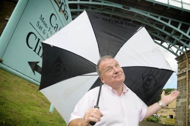 Councillor Andrew Jenkinson shelters from a seagull splattering under Spa Bridge, he is calling for a sea gull cull
133109a