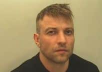 Wanted Russell Frankland, who is said to have attacked security guards before fleeing custody.