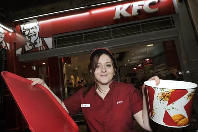 KFC opened to huge queues, but the council hasn't ruled out the chain closing again if problems aren't fixed.