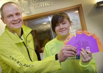 YCH Sports Bursary Award. Yorkshire Coast Homes chief executive Shaun Tymon (left) makes the first YCH Sports Bursary award of £100 towards fuel costs to local athlete Tara Coleman.
