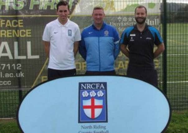 At the launch of the Community Football Hub Club at the University of Hull  Scarborough Campus 3G facility , from left, are, Steve Dorey (football development officer, North Riding FA), Nigel Carson (Boro head of youth development) and Steve Curtis (sports development manager, University of Hull)