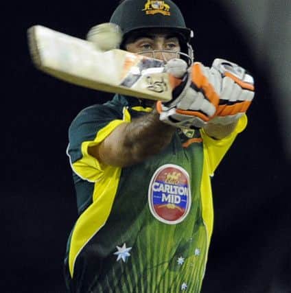 Australia's Glenn Maxwell hits the winning runs against England during their one-day international cricket match at the Melbourne Cricket Ground in Melbourne, Australia, Sunday, Jan. 12, 2014. (AP Photo/Andy Brownbill)