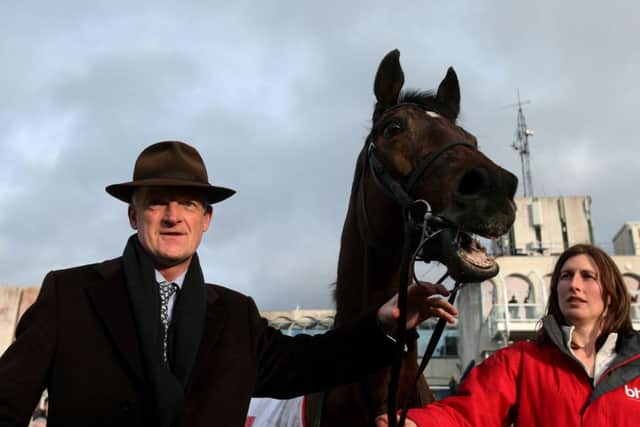 Winning trainer Hurricane Fly with trainer Willie Mullins in the parade ring after winning the The BHP Insurances Irish Champion Hurdle on BHP Insurance Champion Hurdle Day at Leopardstown Racecourse, Dublin. PRESS ASOCIATION Photo. Picture date: Sunday January 25, 2015. See PA story RACING Leopardstown. Photo credit should read: Brian Lawless/PA Wire