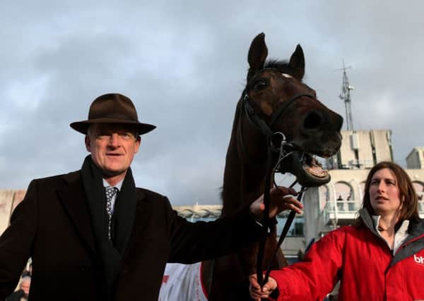 Winning trainer Hurricane Fly with trainer Willie Mullins in the parade ring after winning the The BHP Insurances Irish Champion Hurdle on BHP Insurance Champion Hurdle Day at Leopardstown Racecourse, Dublin. PRESS ASOCIATION Photo. Picture date: Sunday January 25, 2015. See PA story RACING Leopardstown. Photo credit should read: Brian Lawless/PA Wire