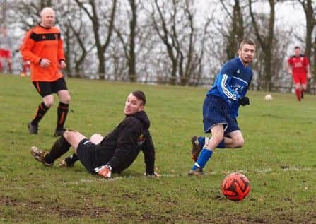 beaten Newlands keeper Sean Pinder watches on as the ball finds the back of his net