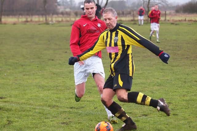 Scalby clear up in defence.