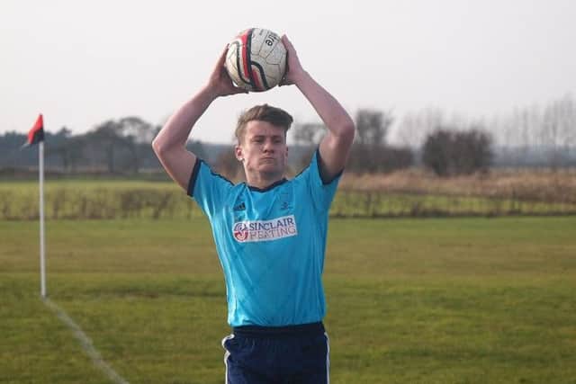 Ricky Nock attempts to throw the ball deep in to Piers half,