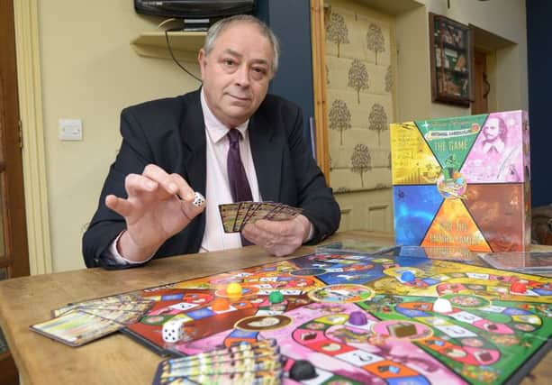 Russell Webster with his new board game