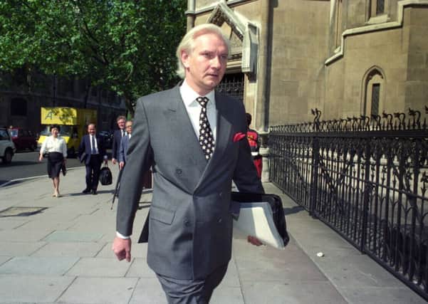 File photo dated 29/07/91 of former conservative MP Harvey Proctor arriving at the High Court in London. Proctor has denied bring part of a "rent-boy ring" or attending sex parties with other prominent figures after his home was searched by police. PRESS ASSOCIATION Photo. Issue date: Thursday March 5, 2015. See PA story POLICE Proctor. Photo credit should read: Louis Hollingsbee/PA Wire