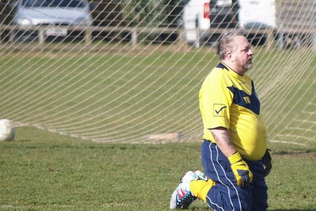 Tony Walker can't bear to see the ball in the back of the net.