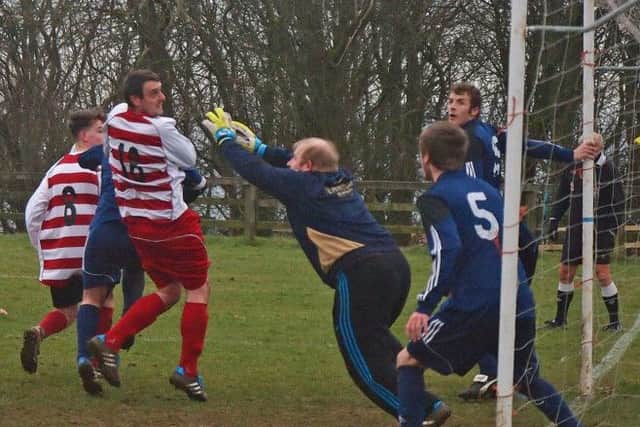 Falsgrave keeper Ryan Goodworth safely collects a Tennyson attempt.