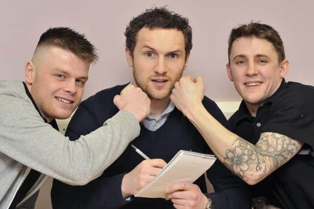 Scarborough boxers George Rhodes Jnr (left) and Shaun Ireland (right) chat with sports reporter Daniel Gregory