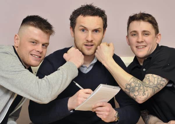 Scarborough boxers George Rhodes Jnr (left) and Shaun Ireland (right) chat with sports reporter Daniel Gregory