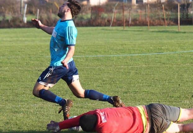 Newlands' Danny Jenkinson is brought down for a penalty by Edgehill keeper Martin Cappleman