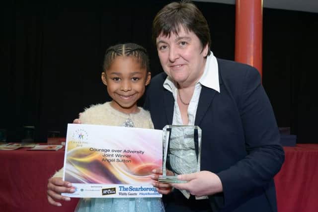 SPA Ocean Room Scarborough.
Borough's Big Thank You Awards 2105.
Award Winners
PA1513-12d
Courage over Adversity Award Joint winners Sponsored by Senior Glass Systems (Michelle Damms presenting)
Winner : Angel Sutton