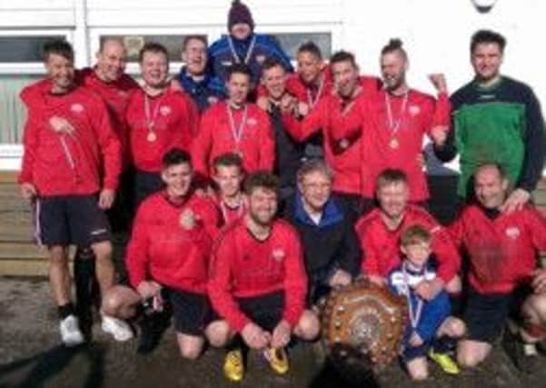 Seamer Sports Reserves celebrate winning the division three title