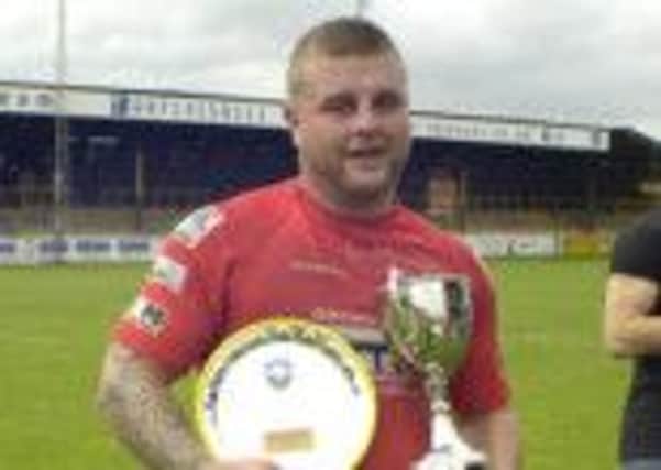 Scarborough Pirates skipper Dave Douthwaite shows off his trophies at the end of last season