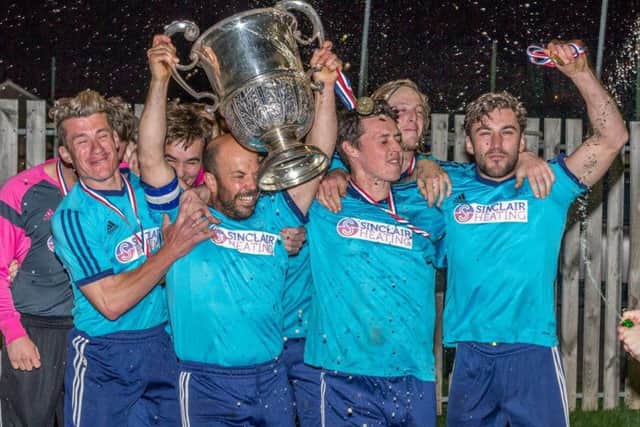 Newlands lift the League Cup. Pictures: Brian Muirfield